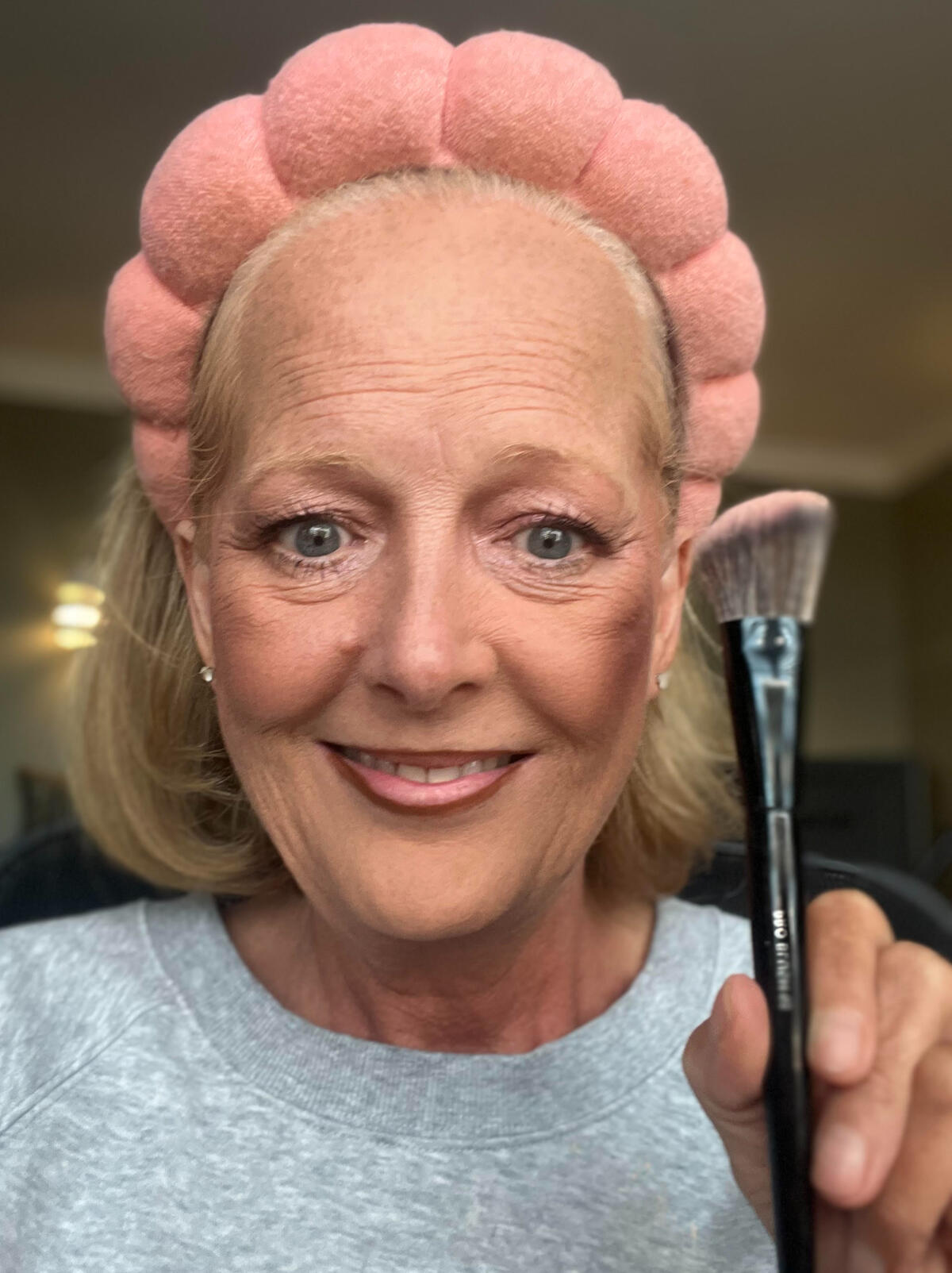 UGC Sephora Collection Pro Blush Brush #93 (Skeepers Sephora Review Photo) Ann Keller GENX UGC holding a Sephora Collection Pro Blush Brush #93 (Skeepers Sephora Review Photo)